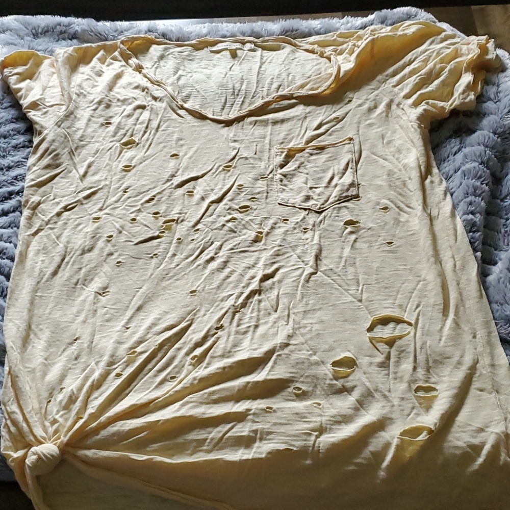 Yellow t-shirt destruction